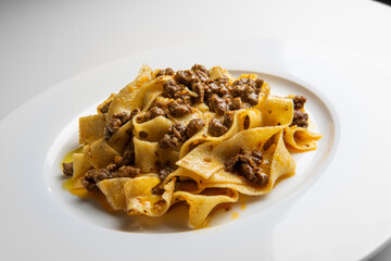 Plate with pappardelle with wild boar ragout sauce