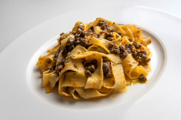 Plate with pappardelle with wild boar ragout sauce