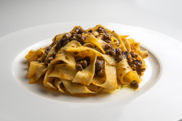Plate with pappardelle with wild boar ragout sauce