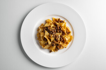Plate with pappardelle with wild boar ragout sauce