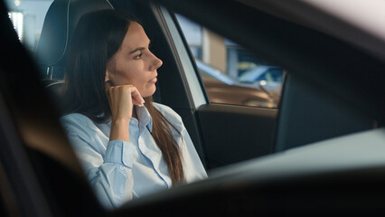 Frustrated stressed angry driver woman hit car steering wheel irritated angry Caucasian female...