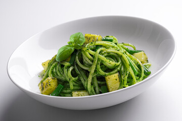 Bowl with linguine with Genoese pesto sauce with potatoes and green beans