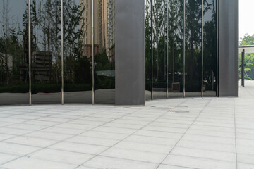 empty concrete ground in front of modern office buildings in downtown. floor for copy space
