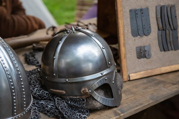 helmet with chain mail to protect a warrior, a traditional warrior's ammunition