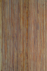wooden background round, thin boards closeup ,brown background vertical lines