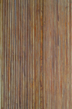 wooden background round, thin boards closeup ,brown background vertical lines