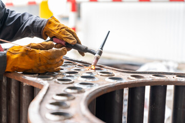 TIG welding of steel tube of boiler.