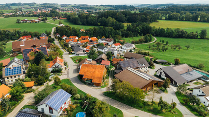 Aerial View of Village Rooftops and Farm in Germany with Solar Panels