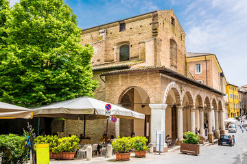A view towards the side of the Rome Square in the center of the city in Urbino, Italy in summertime