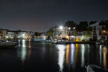 Fototapeta premium Night view of the select neighborhood of Lecheria where each house has its own marina to dock its yachts.