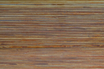 wooden background round, thin boards close-up ,brown background horizontal lines