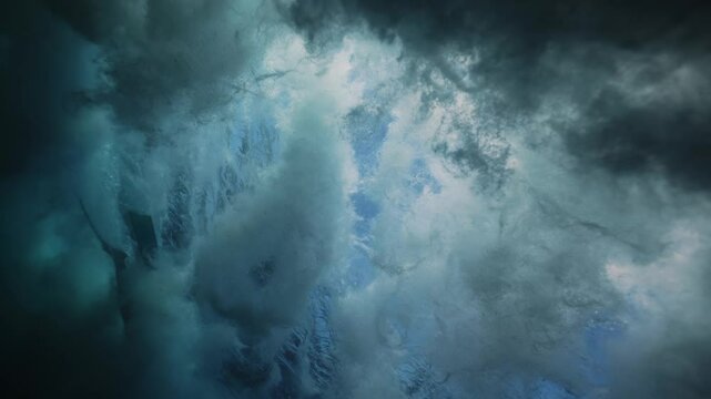 Powerful strong wave breaks underwater turbulence, wave crashing on the corral reef in tropical ocean. spinning vortex. powerful nature, strong wave, danger of drowning. seascape slow motion.