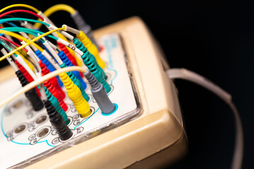 Close-up colorful EEG electrode wires...