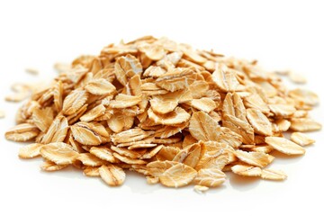 Close-up of a heap of raw rolled oats, showing texture and detail against a clean white background, representing healthy breakfast ingredients.