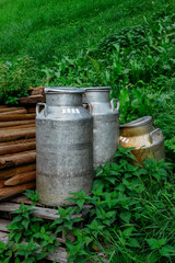 Fototapeta premium Old metal milk containers