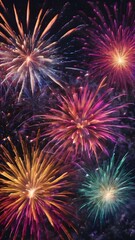Fototapeta premium Fireworks in the night sky with multi-colored bursts 