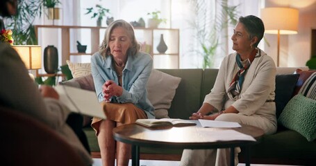 Mature women, friends and holding hands with psychologist for counseling, support and guidance. People, care and sad with conversation on therapy for stress management, mental health and advice