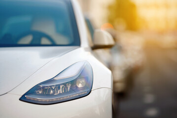 Car LED headlight closeup. Modern automotive lighting technology, sleek design, energy efficiency...