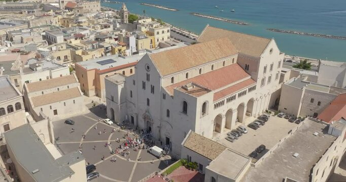 Aerial view of the Pontifical Basilica of Saint Nicholas in the old town of Bari, Puglia, Italy. It is a Catholic Church in the historic center of the city built in the Apulian Romanesque style.
