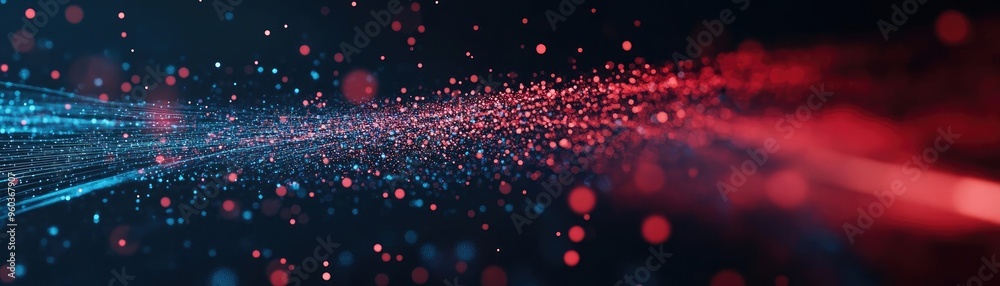 Poster Dynamic burst of colorful particles in motion, creating an abstract and vibrant background with red and blue hues.
