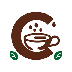 a cup of coffee with a leaf in the middle.