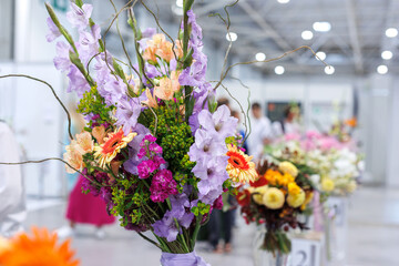 Modern beautiful bouquets of flowers at the exhibition.