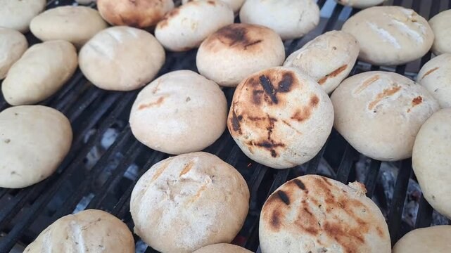 Traditional food of Bihar, Litti getting baked on a grill