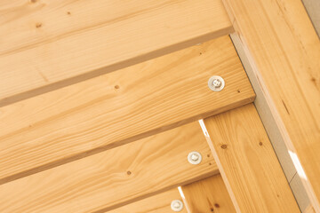 Natural Wood Construction Featuring Fasteners for a Sturdy Outdoor Decking Installation