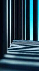 Fototapeta premium A modern architectural perspective featuring vertical lines and shadows, creating a dynamic visual experience with a blue backdrop.