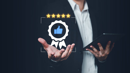 Businessman hand hold and show best quality guarantee with five golden stars and Like icon for product guarantee and service