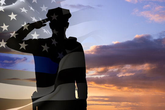 Silhouette of a police officer against the sunset. American flag with police support symbol. Thin blue line. National Law Enforcement Appreciation Day concept