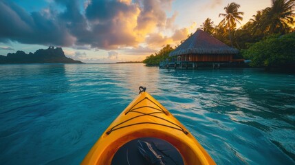 Kayak boat in tropical sea water at sunset