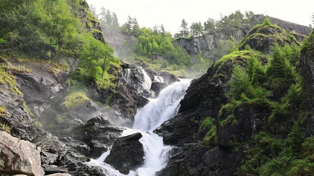 L&aring;tefossen waterfall in slow motion in odda, Norway in 4K.