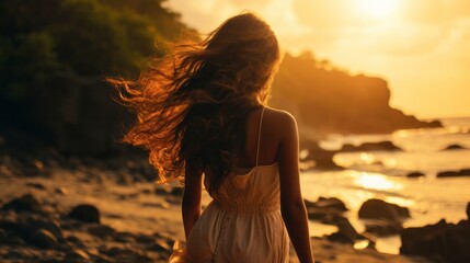 a stunning woman with flowing hair walking along a secluded tropical beach at sunset
