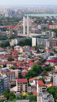 Aerial drone view of buildings around the Basarab Overpass bridge in Bucharest, Romania. Vertical