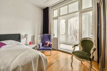 Elegant bedroom with balcony access and classic decor