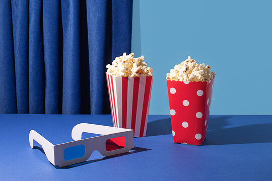 Cinema night essentials displayed against a blue backdrop