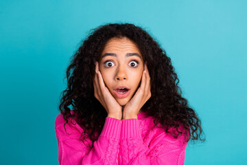 Portrait of nice young girl open mouth hands touch cheeks wear pink pullover isolated on turquoise color background