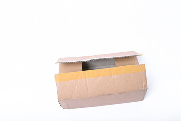 Closeup blank delivery box or cardboard box open isolated on white background. Paper box