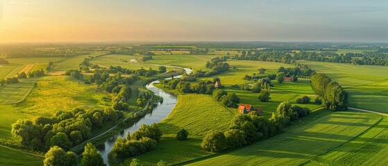Serene Aerial View of Lush Farmland with Patchwork Fields, Farmhouses, and Winding River in High- Quality