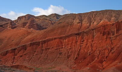 Northern Kyrgyzstan. Picturesque winding trails of the Kok Moinok canyons with red-brown rock along the Chu River.