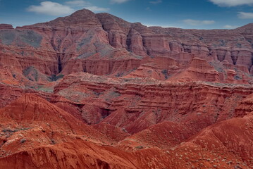 Northern Kyrgyzstan. Picturesque winding trails of the Kok Moinok canyons with red-brown rock along the Chu River.