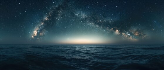 Starry Night Serenity: Mesmerizing Milky Way Galaxy Above Tranquil Ocean Scenery, Ideal for Astrophotography Enthusiasts