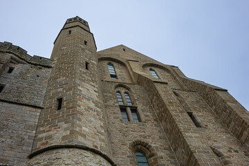 Detail of the Abbey Mont Saint-Michel (VII century) at rocky tidal island in Normandy - one of most visited tourist sites in France. Normandy, Northern France, Europe.