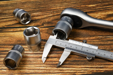 Vernier caliper and ratchet wrench