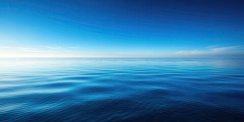 Obraz premium A beautiful and serene image of a gradient background showcasing the mesmerizing shades of ocean blue water from an eye level perspective, mesmerizing, background, blue, image, shades