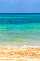 Tropical Caribbean beach clear turquoise water Playa del Carmen Mexico.
