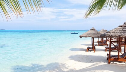 Fototapeta premium plage vacance sable blanc palmier transat parasol océan turquoise