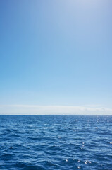 Seascape with horizon and clear sky, Pacific Ocean.