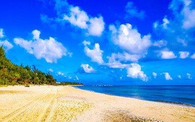 Tropical Caribbean beach people swim fun Playa del Carmen Mexico.